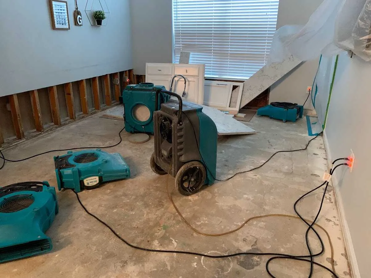 Dehumidifier in flood-cut room for Water Damage Restoration in Hampstead